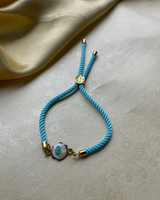 Light blue azure evil eye charm thread rakhi