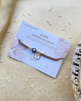 Beige Evil Eye & Personalised Charm Thread Rakhi