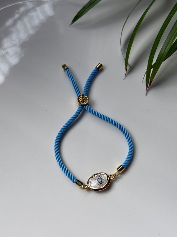 Ice Blue Celestial Evil Eye Thread Rakhi